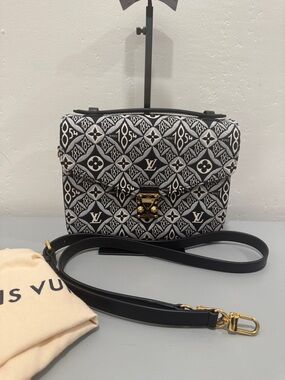 Louis Vuitton 1854 pouchette Métis